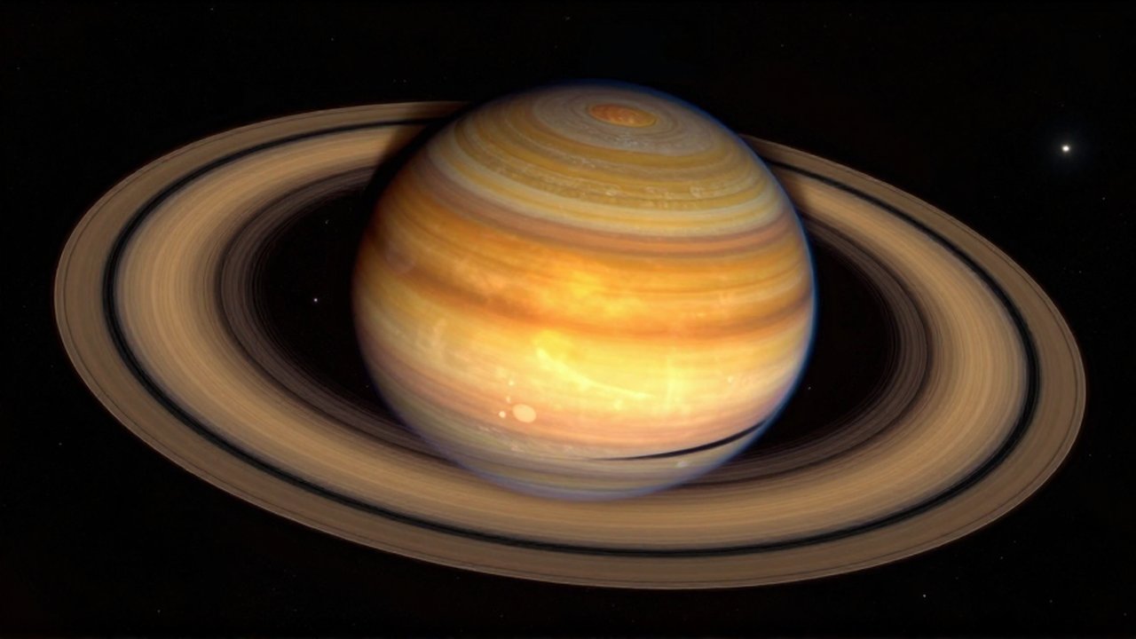 Corte transversal de Saturno que muestra su núcleo incandescente rodeado de hidrógeno metálico y gases.